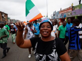 A supporter of coalition parties Democratic Party of Cote d'Ivoire (PDCI) and the African People's Party of Cote d'Ivoire (PPA-CI) protests against the removal of the parties’ leaders from the ballot paper ahead of the presidential election, Abidjan, Cote d'Ivoire, 9 August, 2025. Credit: Luc Gnago / Reuters